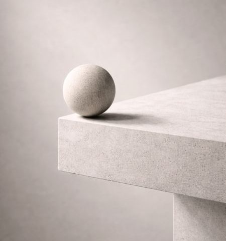 Stone sphere on edge